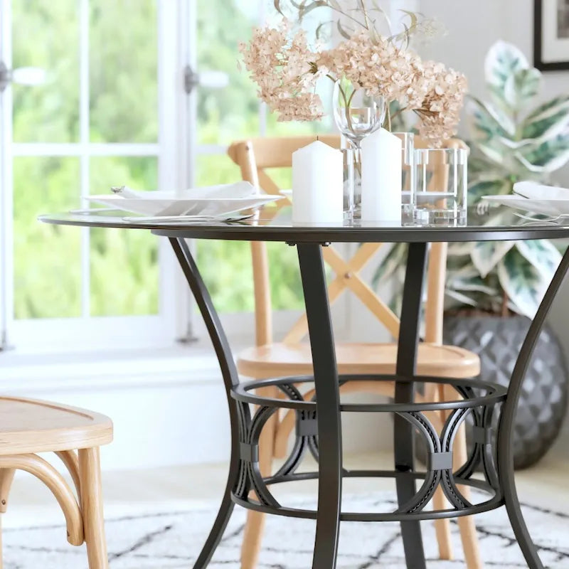 Table à manger ronde en verre trempé avec piédestal ornemental en forme de croissant et cadre en métal