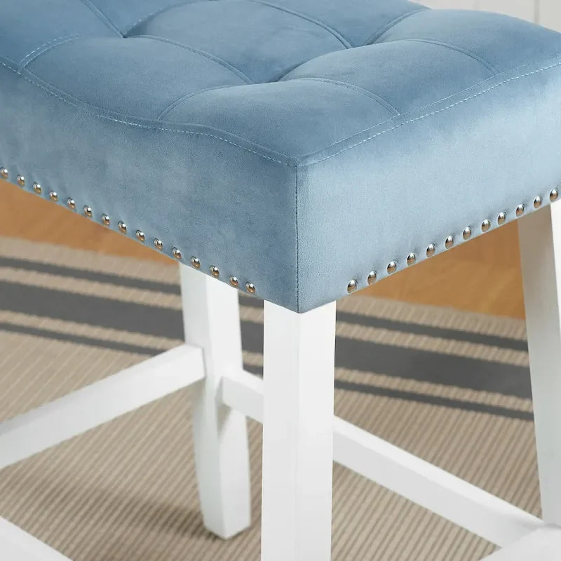 Tabouret de comptoir sans dossier en velours capitonné avec garniture cloutée et pieds blanchis