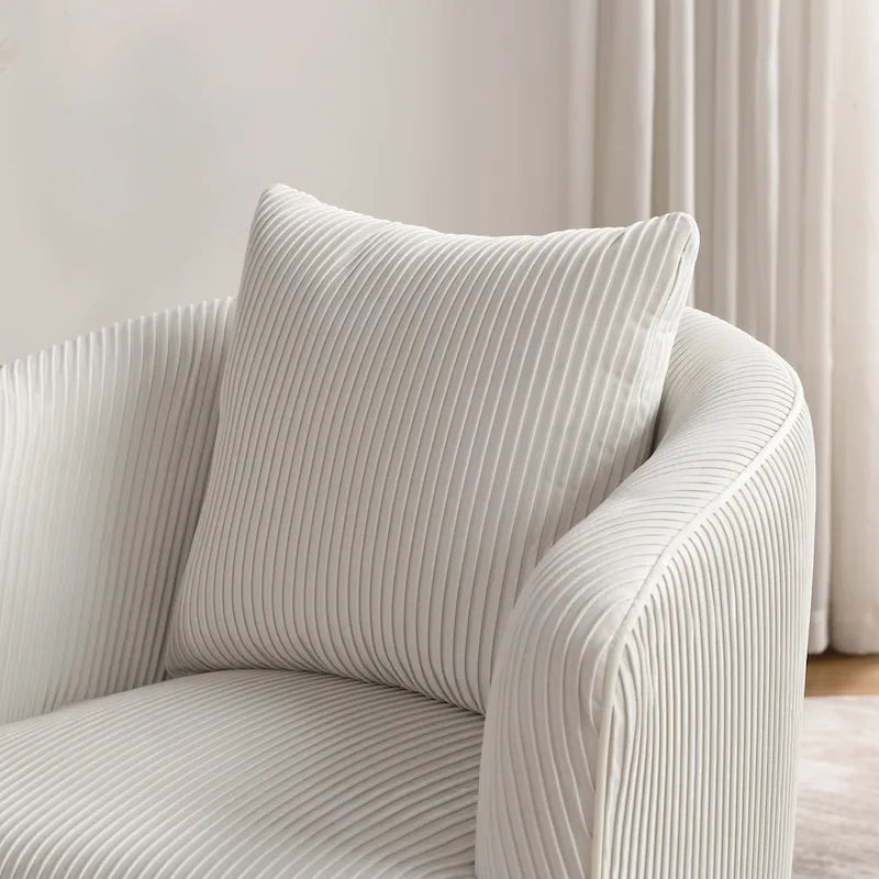 Fauteuil contemporain à dossier incurvé en velours côtelé, coussin amovible, pieds en métal doré