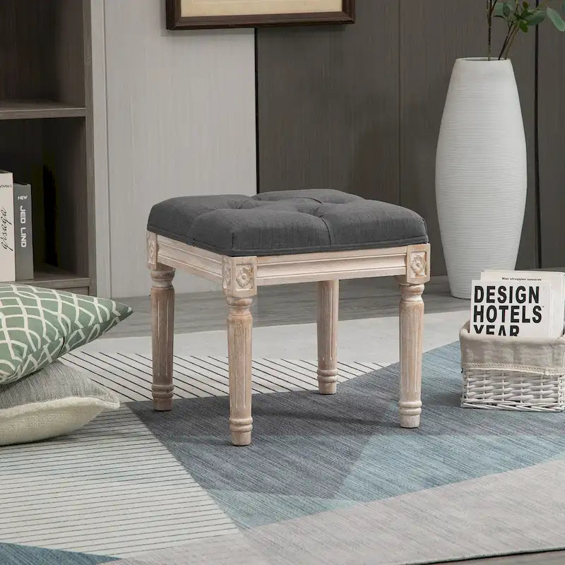 Pouffe carré capitonné en lin avec pieds sculptés en hévéa de 40 cm