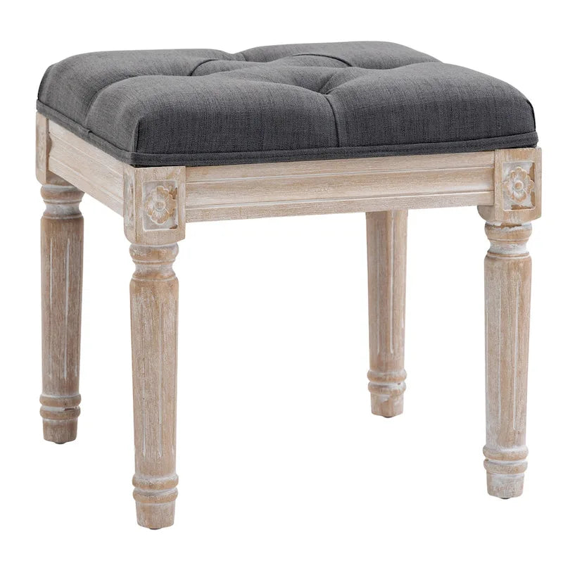 Pouffe carré capitonné en lin avec pieds sculptés en hévéa de 40 cm