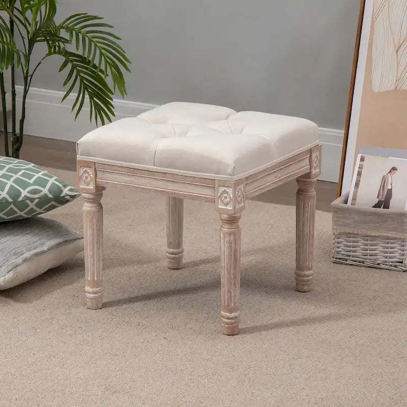 Pouffe carré capitonné en lin avec pieds sculptés en hévéa de 40 cm