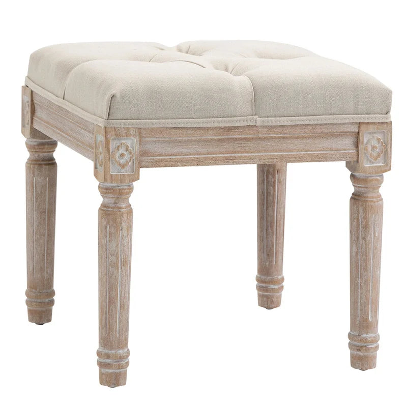 Pouffe carré capitonné en lin avec pieds sculptés en hévéa de 40 cm