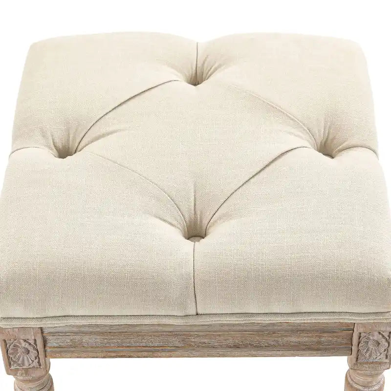 Pouffe carré capitonné en lin avec pieds sculptés en hévéa de 40 cm