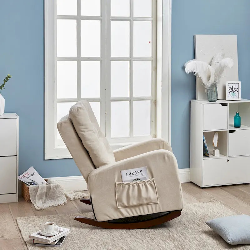 Fauteuil à bascule capitonné à dossier haut, pochette latérale, basculeurs en bois massif